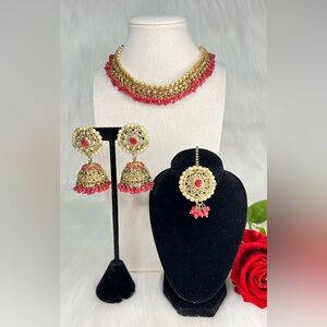 Hot Pink and Gold Choker Necklace With Jhumkas And Tikka Set